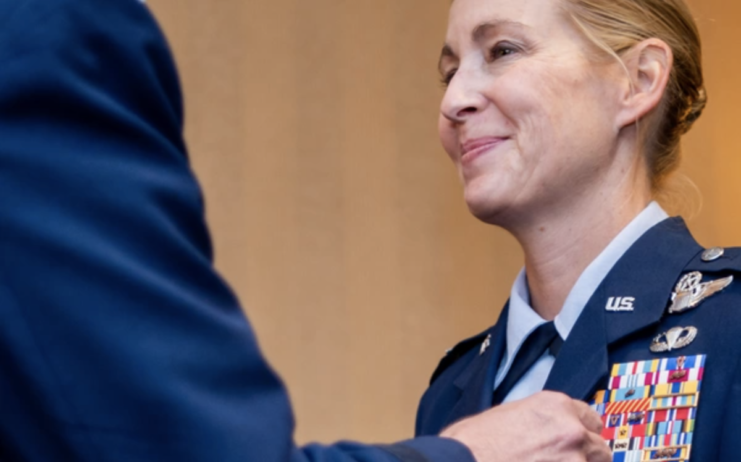 Kim Campbell receiving the Legion of Merit