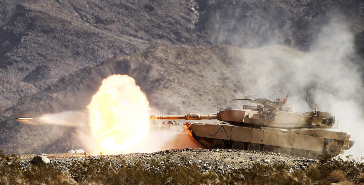 Tank firing a sabot round