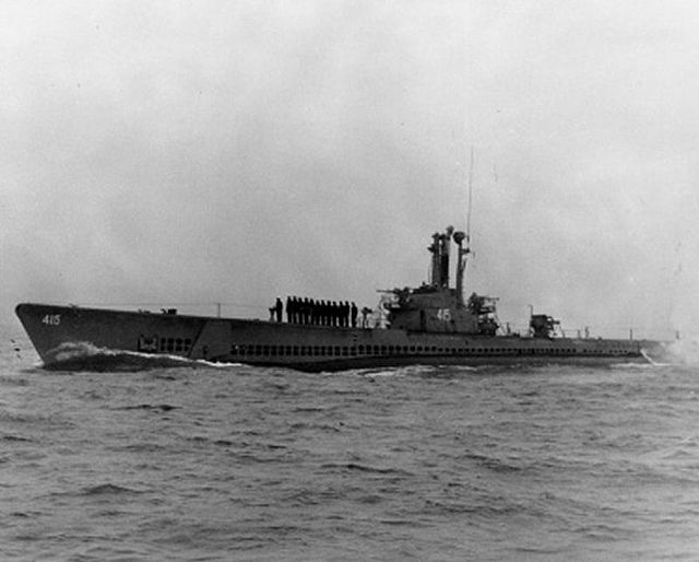USS Stickleback (SS-415) surfacing at sea