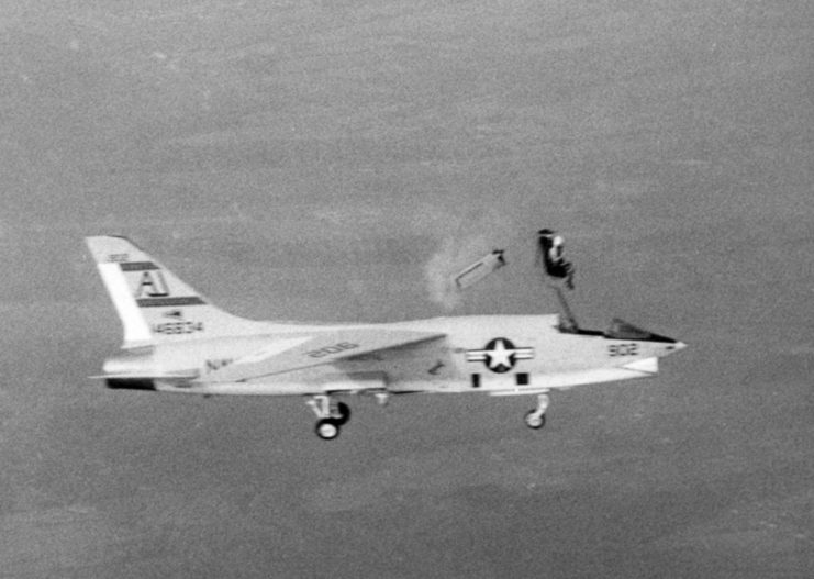 Pilot ejecting from a Vought RF-8A Crusader mid-flight