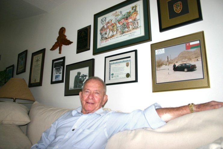 Billy Waugh sitting on a couch