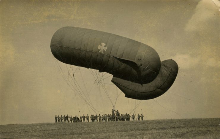 Group standing below a German Parseval-Siegsfeld observation balloon
