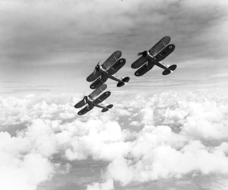 Three Gloster Gladiators flying