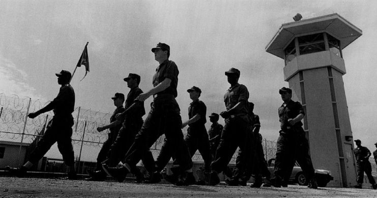 Impact program members marching along the grounds of the Elayn Hunt Correctional Facility
