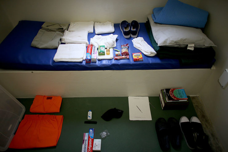 Prisoner supplies laid out on a bunkbed in Guantanamo Bay detention camp