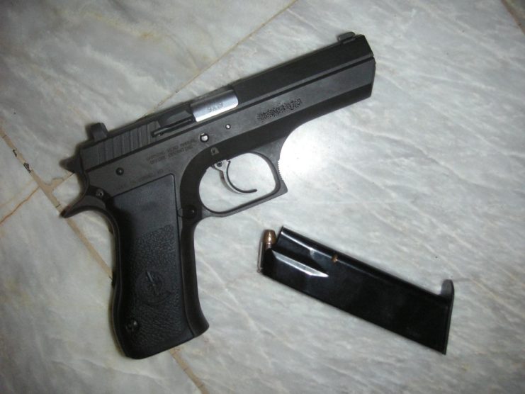 IWI Jericho 941 and its magazine on a floor