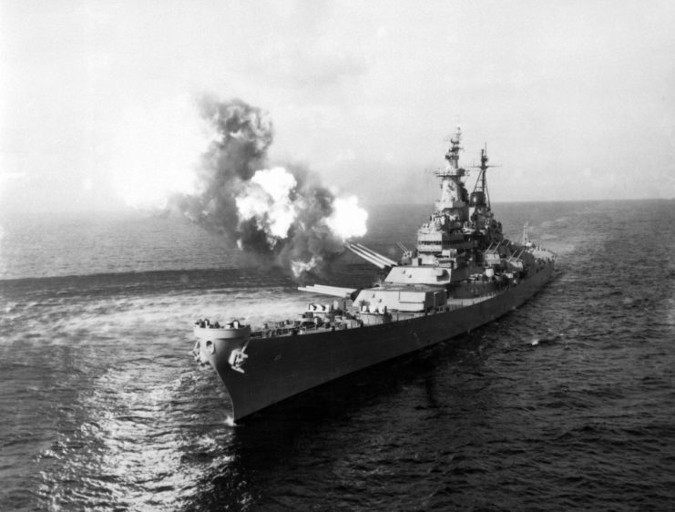 USS Missouri (BB-63) firing her deck guns while at sea