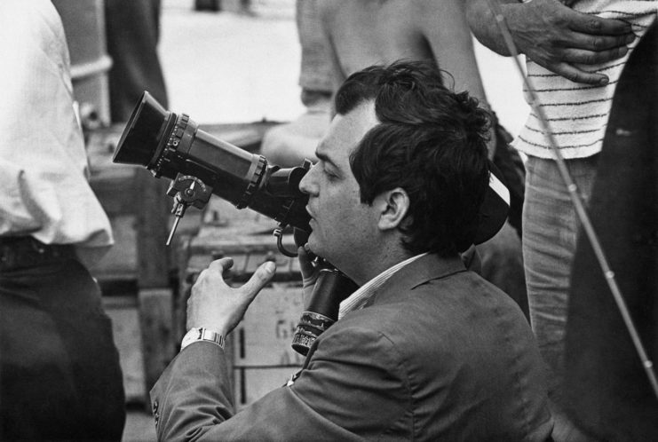 Stanley Kubrick holding a camera