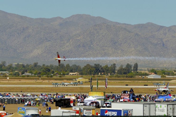 Red Bull Demonstration Team aircraft flying over a crowd at Luke Air Force Base, Arizona