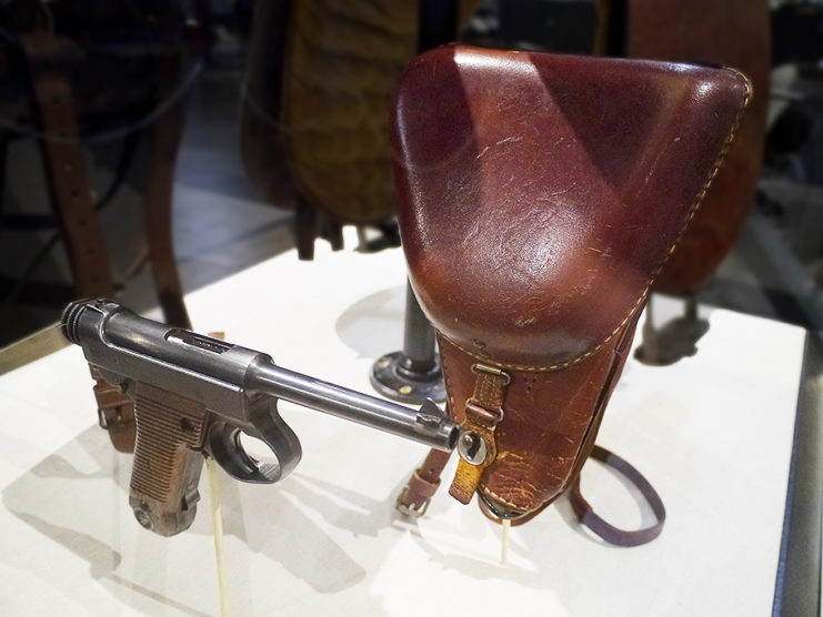 Type 14 Nambu pistol and holster on display