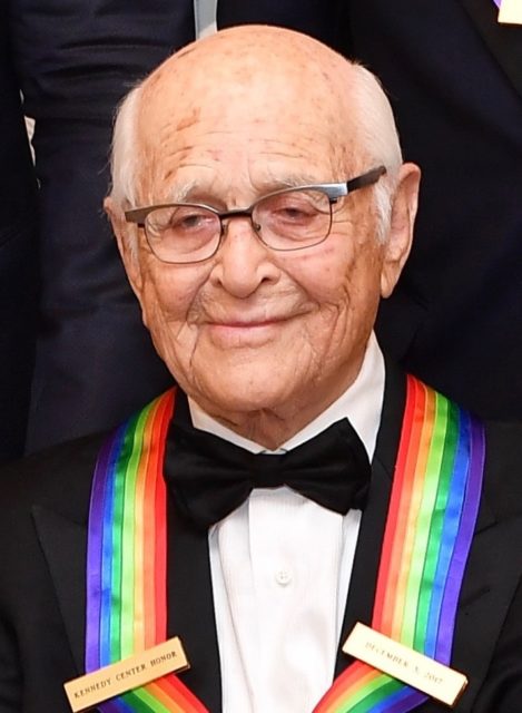 Norman Lear wearing a suit