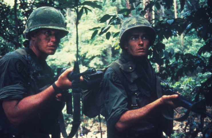 Tom Berenger and Charlie Sheen as Staff Sgt. Bob Barnes and Chris Taylor in 'Platoon'
