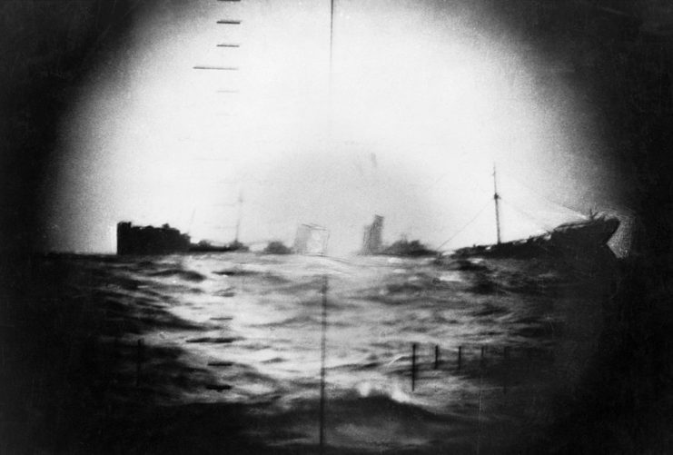 Japanese ship sinking beneath the water