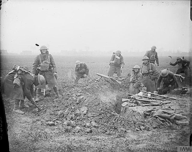 Members of the 51st (Highland) Division digging into the ground