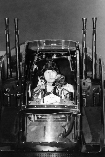 J. Morgan sitting in the rear turret of an Avro Lancaster