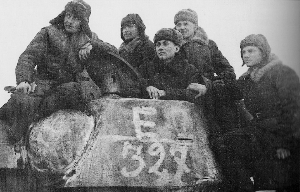 Red Army soldiers positioned on top of a T-34