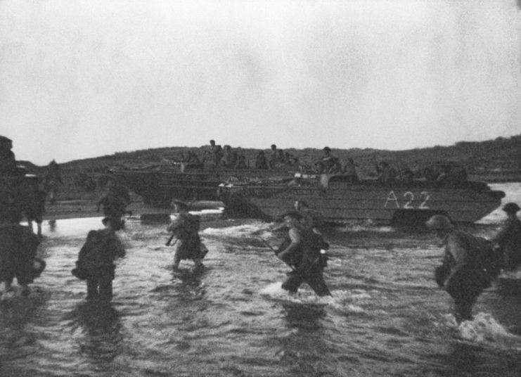 Canadian assault troops wading through water