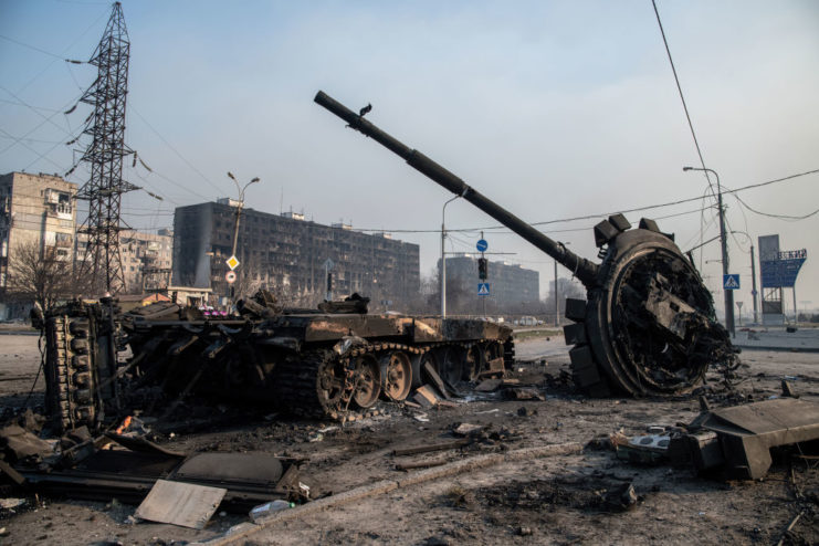 Damaged Russian tank on a road in Mariupol