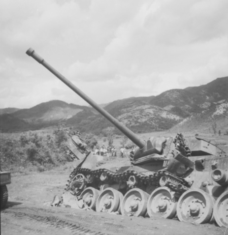 Damaged Centurion along the side of a dirt road