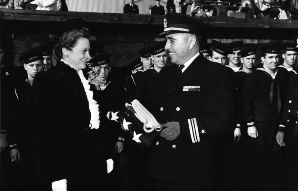 Ernest Evans smiling during the commissioning ceremony for the USS Johnston (DD-557)