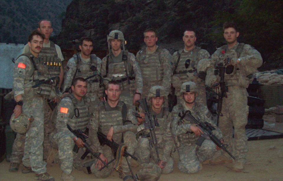 Members of the 61st Cavalry Regiment standing together