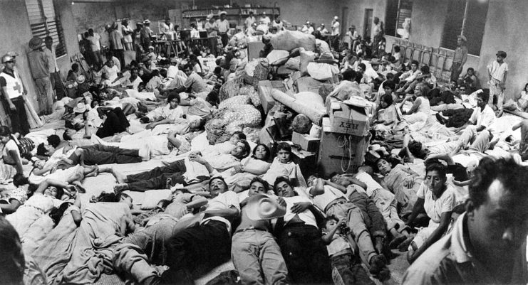 Group of Salvadorian citizens gathered together in a room