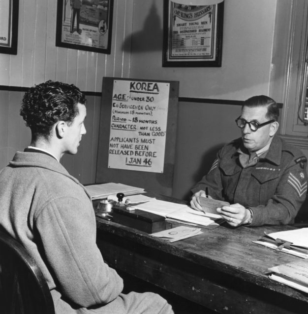 British military official interviewing a potential enlistee