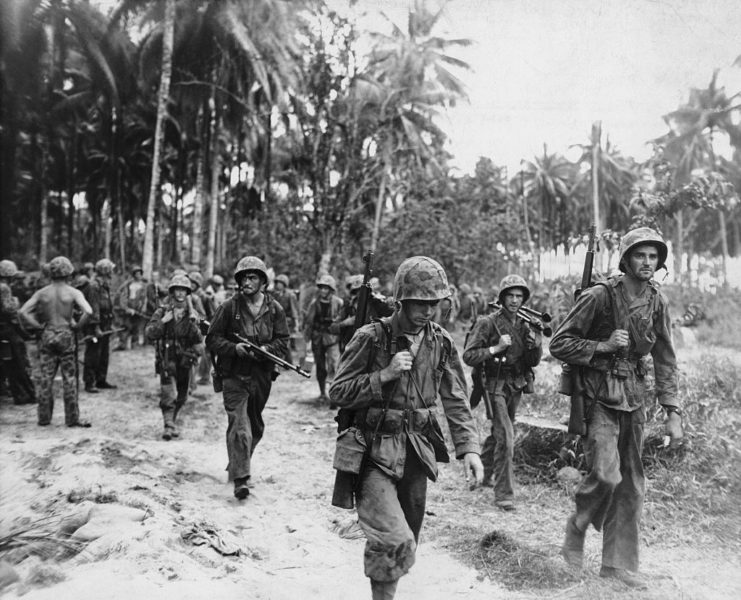 US Marines marching through the jungles of New Guinea