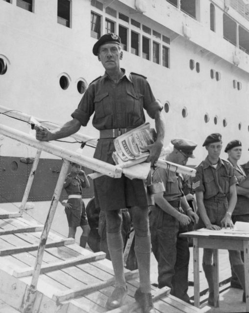 James Carne preparing to board a ship