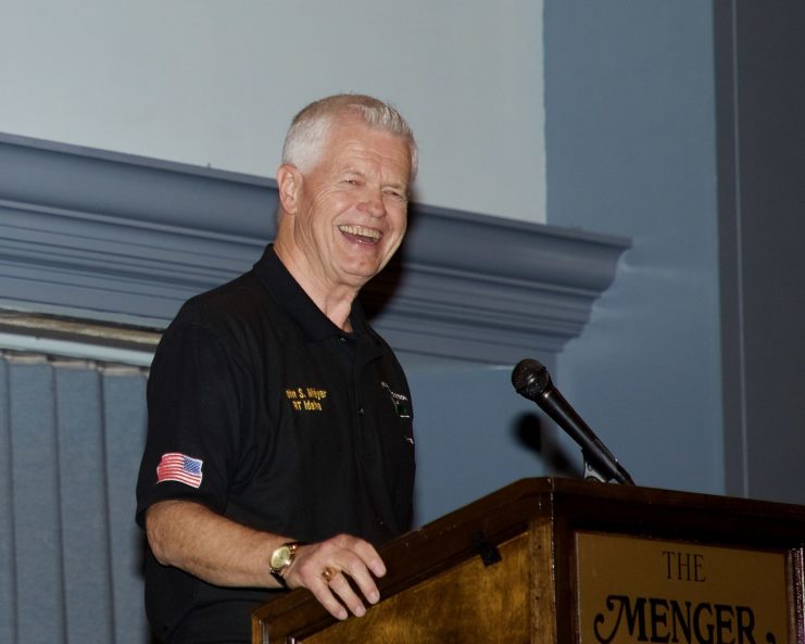 John Stryker "Tilt" Meyer speaking at a podium