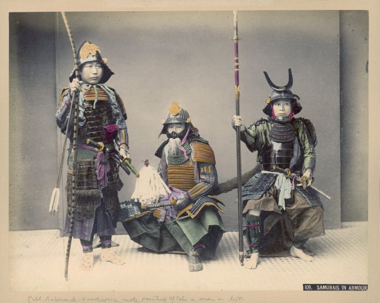 Three samurai dressed in traditional armor