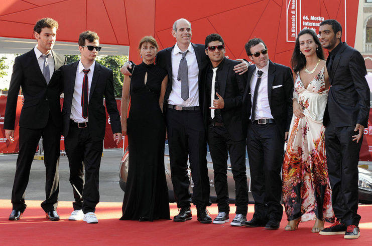 Cast of 'Lebanon' standing together on a red carpet