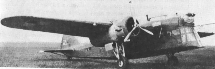 PZL.30 parked on grass