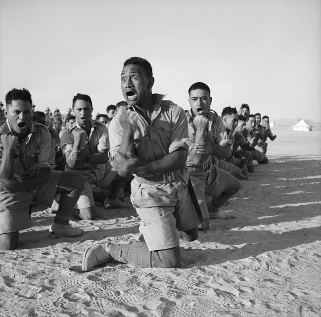 Māori Battalion putting on a ceremonial performance in the desert