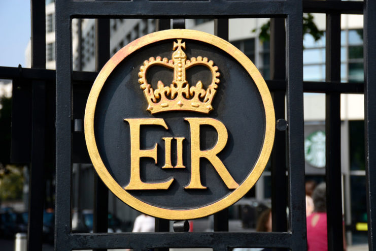 Royal Cypher of Queen Elizabeth II imprinted on a metal gate