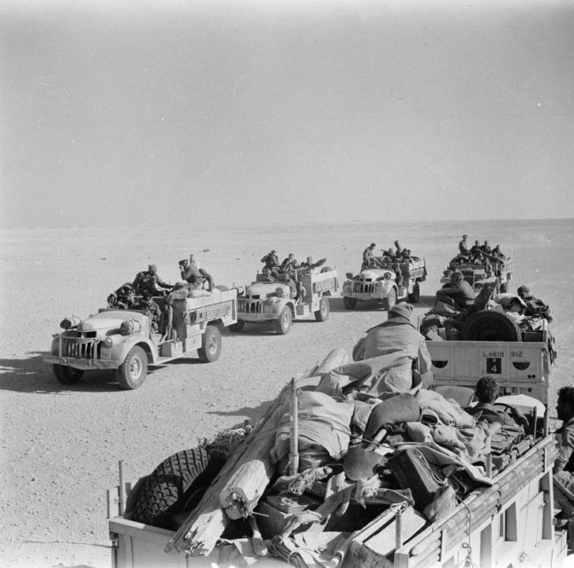 Six trucks filled with members of the Long Range Desert Group (LRDG)