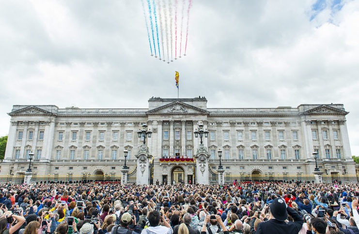Crowd watching the Red Arrows fly over Buckingham Palace