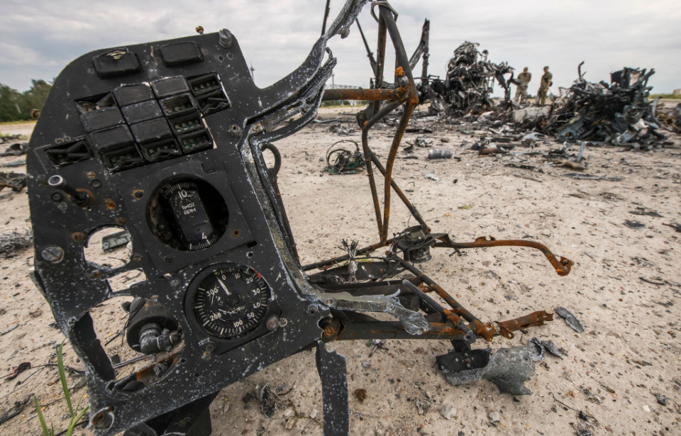 Mangled parts from a Kamov Ka-52 strewn across the ground
