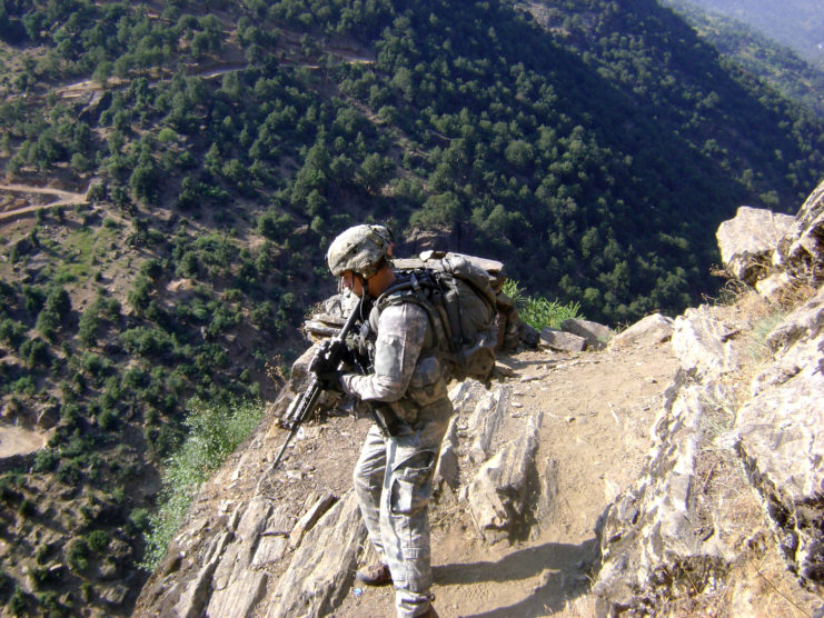 Clinton Romesha patroling the mountains near Combat Outpost Keating