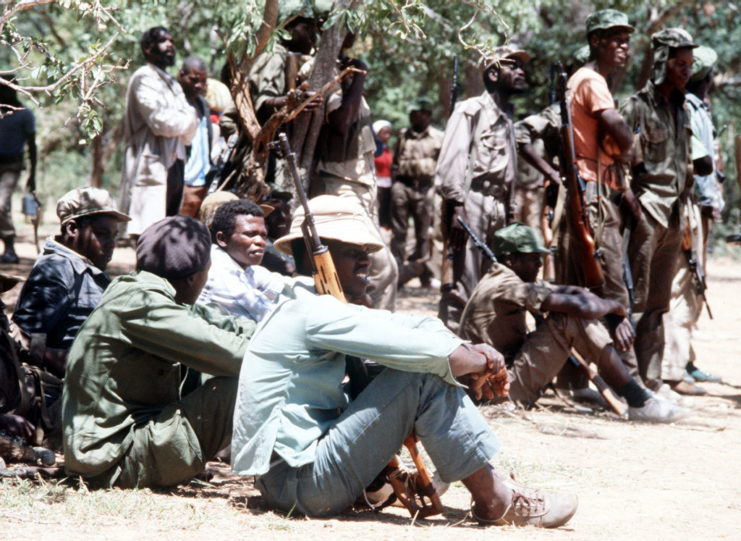 Zimbabwe African National Liberation Army (ZANLA) guerrillas sitting together