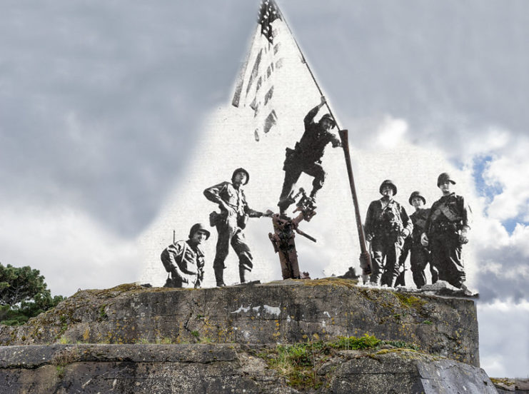 American soldiers raising the country's flag at Saint-Malo