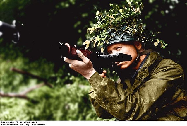 Soldier aiming an FG 42