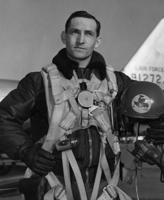 George Andrew Davis Jr. holding his pilot's helmet