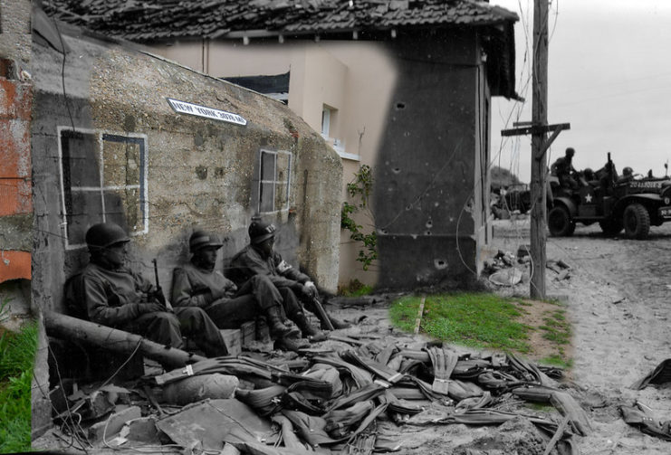 Members of the 4th Infantry Division sitting against the wall of a captured German Naval Signals Command bunker