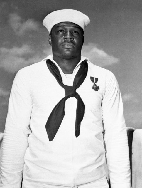 Doris Miller standing in his US Navy uniform