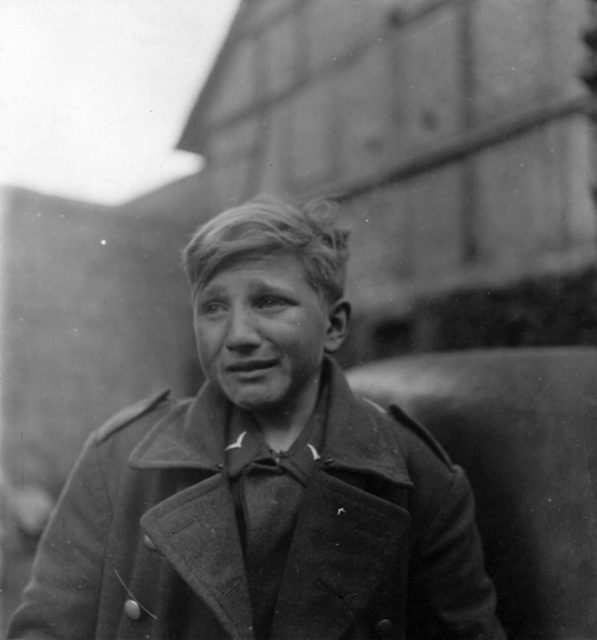 Hans-Georg Henke crying while in uniform