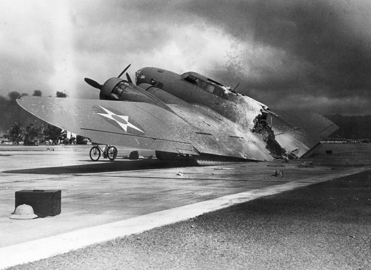 Damaged Boeing B-17 Flying Fortress parked on a runway
