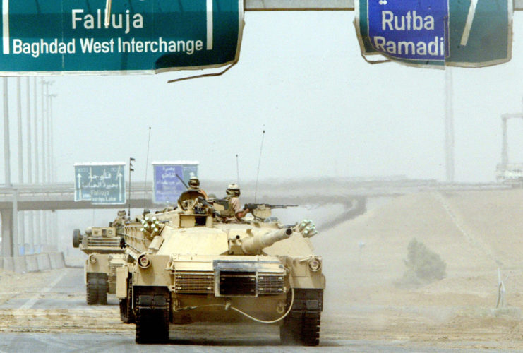 Tanks driving along a highway