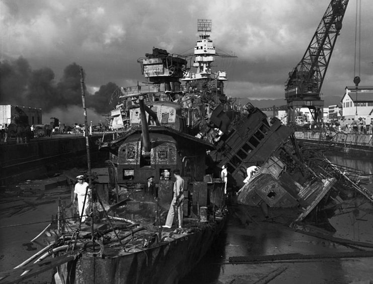 USS Pennsylvania (BB-38) parked behind the remains of the USS Downes (DD-375) and Cassin (DD-372)