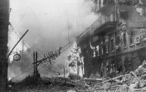 Burning building and downed power lines in Ukraine